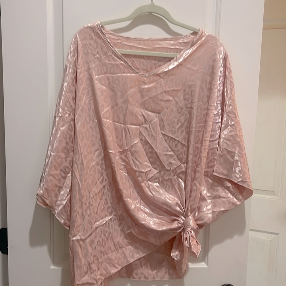 Light pink top. Thin material